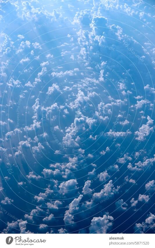 Flight over clouds. Wonderful panorama from window of plane with white clouds sky flying flight sun view cloudscape blue landscape air heaven weather