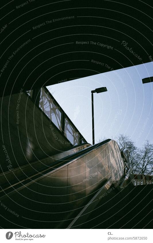 escalator Escalator Lantern Subway station subway station Train station Stairs Architecture Deserted Station Upward Stop (public transport) Lamp post Sky Dark