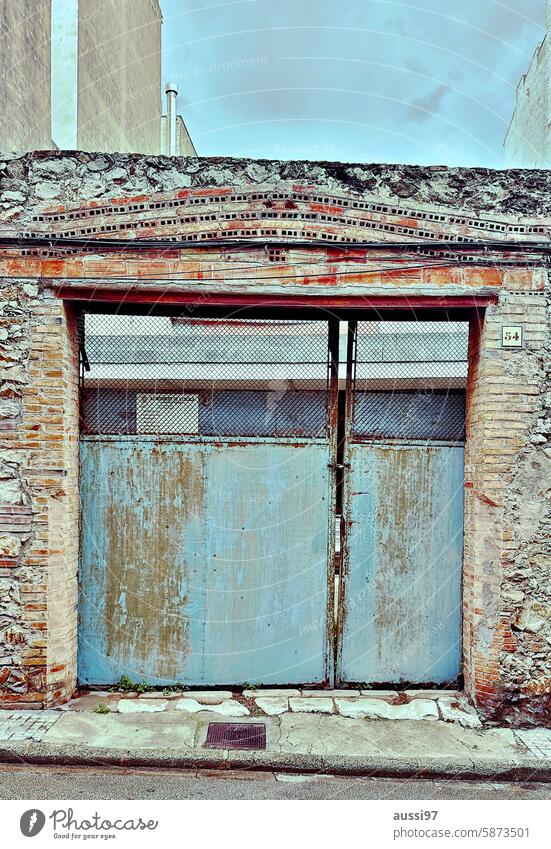 Tooooooor!!! Deserted Wall (building) Exterior shot Facade Spain Clearway Wall (barrier) Building Derelict Old Colour photo Corrosion Empty Business