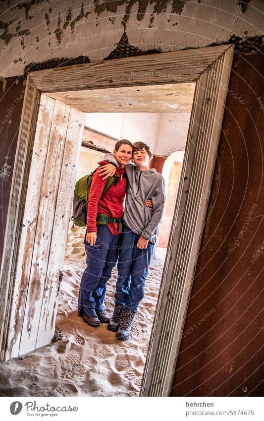 traveller Passage Doorframe door Transience Contentment Happy Joy fun in common Together Infancy Child Family & Relations Son Africa Namibia Desert Wanderlust