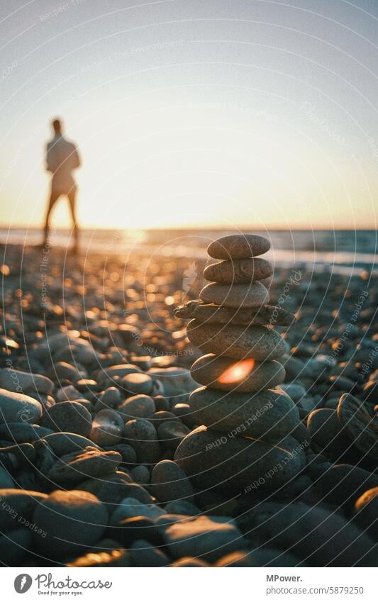 stoneman on the beach Baltic coast Tourism Relaxation Baltic Sea vacation Evening Landscape stone tower Walking Sky Horizon Sunset stones Steinernes Meer Beach