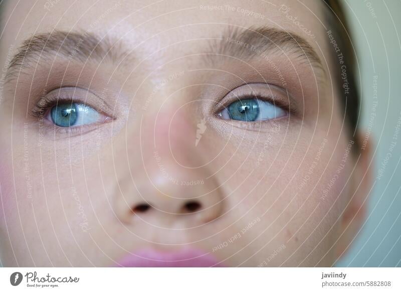 Close-up of a caucasian woman with blue eyes close-up adult skin care studio fashionable beautiful people one woman only beautiful woman calm one person