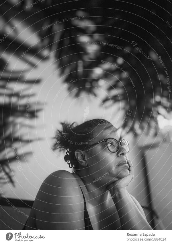 Lost in thoughts Woman portrait thoughtful messy hair black and white