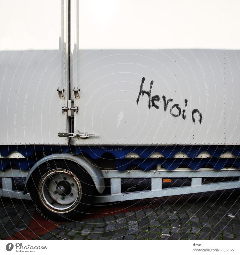 Heroin of the highway Trucks Tire graffiti female hero Hinge Flap Loading space Shadow sunny Wheel Traverse writing Letters (alphabet) Painted Text Characters