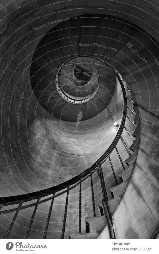 View upwards in the lighthouse Stairs stair treads Banister Lighthouse Upward rail Go up Structures and shapes Deserted Lighting Light and shadow