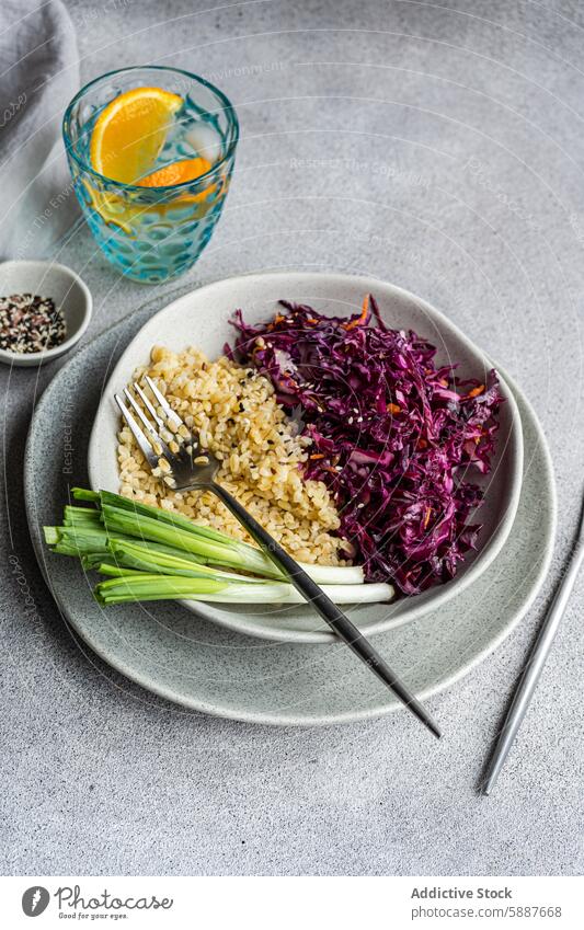 Healthy lunch with red cabbage salad and boiled bulgur meal healthy nutrition carrot plate ceramic gray green onion fresh dietetic fluffy raw vegetable food