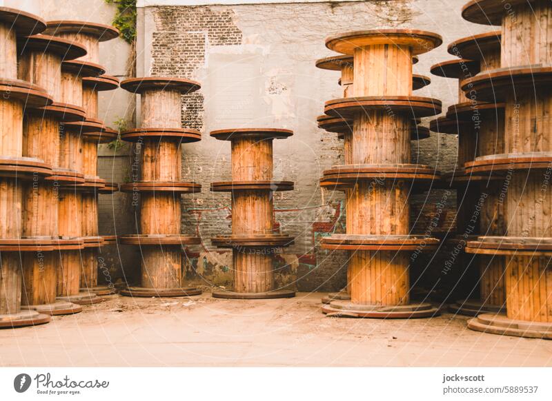 Stacked empty drums Empty drum cable drum storage stacked Arrangement Many Consecutively Fire wall Storage Wooden spool Authentic Supply Collection reuse