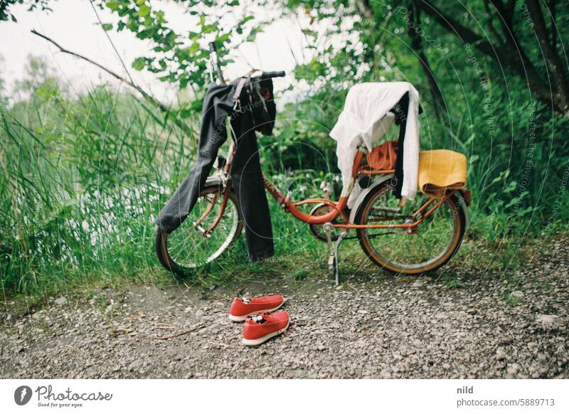 bathing day folded Folding bicycle garments go for a swim Bicycle Colour photo Exterior shot Swimming & Bathing bank Summer bathe Relaxation Extract be afloat