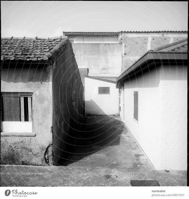 Symmetry in the fishing village Porto Portugal Fishermans hut Ocean Atlantic Ocean Gloomy forsake sb./sth. S&W Simple arm Backyard Lisbon Window