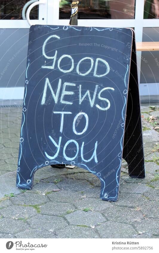 good news good news to you for you message News & Events embassy Good enjoyable Blackboard display out Public Street Text Remark Handwritten