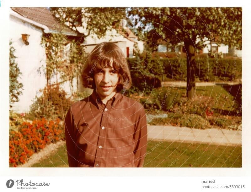 yesterday teenager younger 70s Beatle haircut Beatles Colour photo Exterior shot Human being Boy (child) Color photo Retro Colours House (Residential Structure)