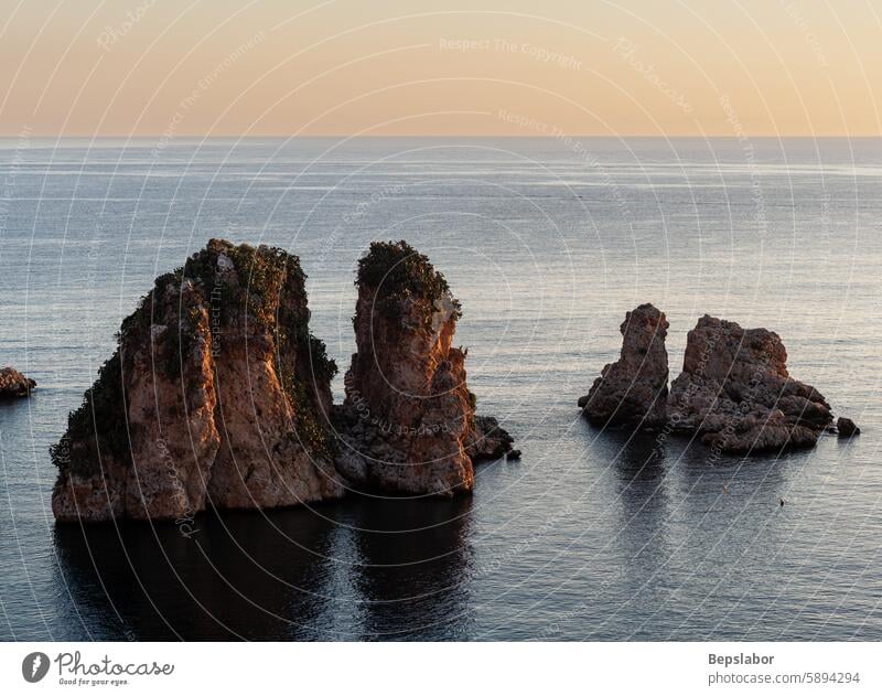 View of Faraglioni, Scopello, Trapani, Sicily, at sunrise italy sea stack blue outdoors sunny water travel italian mediterranean photography seascape shore bay