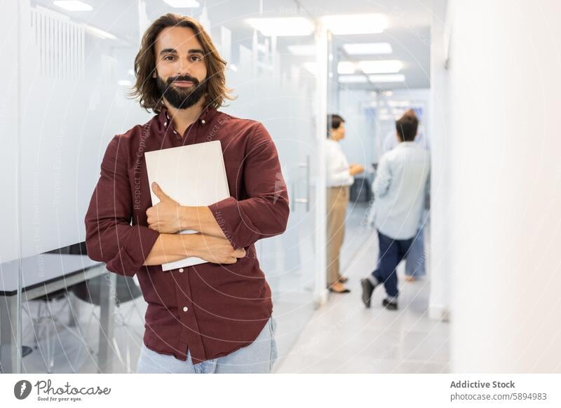 English academy team collaboration in modern office male teacher colleagues discussion casual technology laptop education readiness teamwork learning training