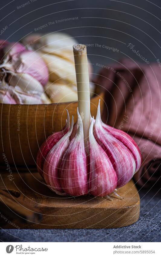 Artistic representation of fresh garlic cloves on a wooden board ingredient cooking kitchen organic close-up rustic culinary herb spice seasoning food vegetable