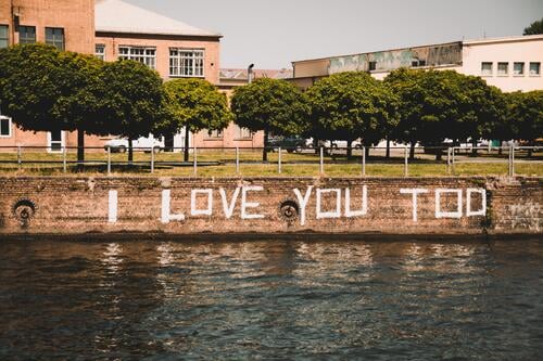 I love you too bank of the Spree Street art Word English Capital letter Berlin Deciduous tree Characters Neutral Background Reflection Building Depth of field