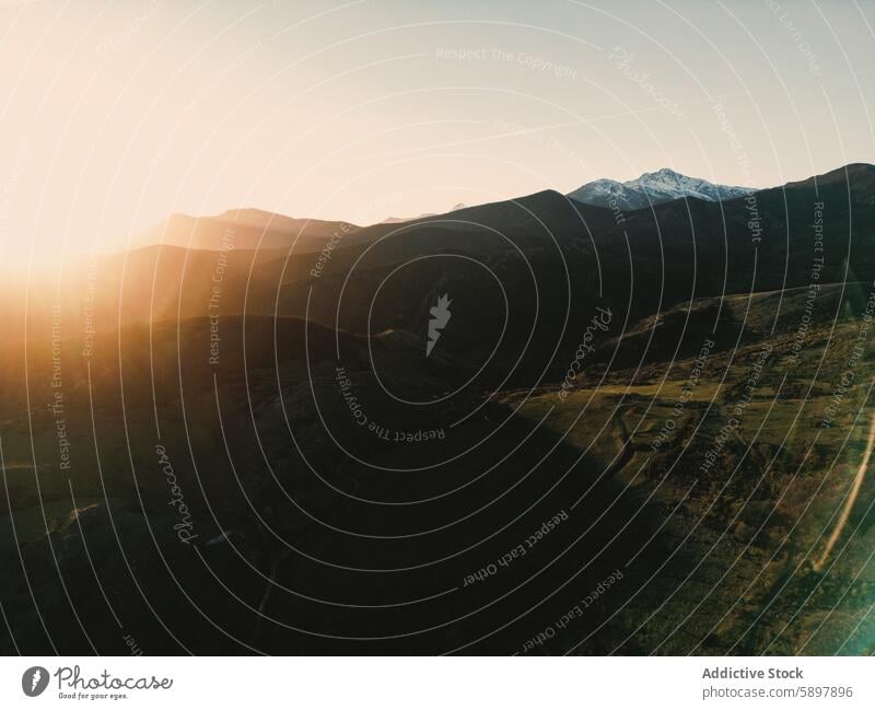 Sunset over the snow-capped mountains of Curavacas and Espiguete sunset peak palencia curavacas espiguete landscape aerial view terrain rugged beauty serene