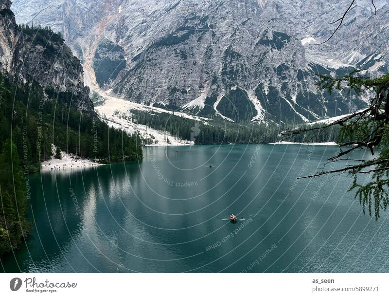 Braies Wild Lake Alps mountains Turquoise Green Waves Mountain Water Landscape Nature Sky Blue Clouds Exterior shot Summer Lakeside Colour photo Environment