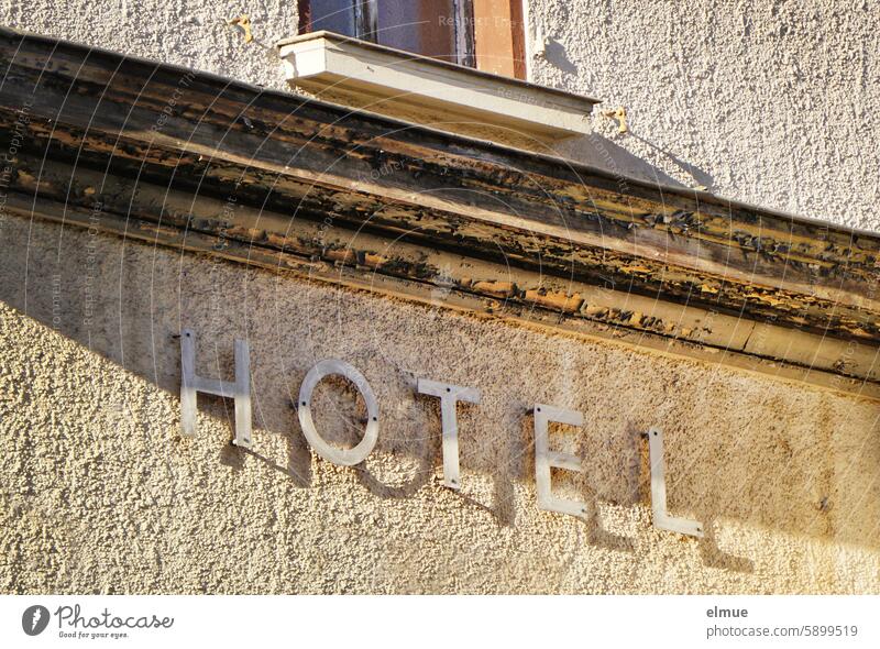 dilapidated building with lettering - HOTEL - Hotel spend the night once upon a time Hotel room Tourism Nostalgia overnight Accommodation business trip