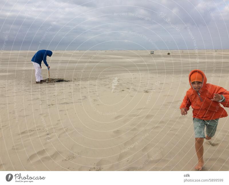 Strong summer winds on Borkum | dig in or fly away? North Sea North Sea Islands Sand Beach wide holidays Summer vacation Child Boy (child) Orange Man Father