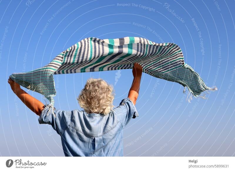 Hallig Gröde | only flying is more beautiful ... Human being Woman Senior citizen Rear view Rag Uphold To hold on Wind Flying Blow Airy Sky Summer sunshine