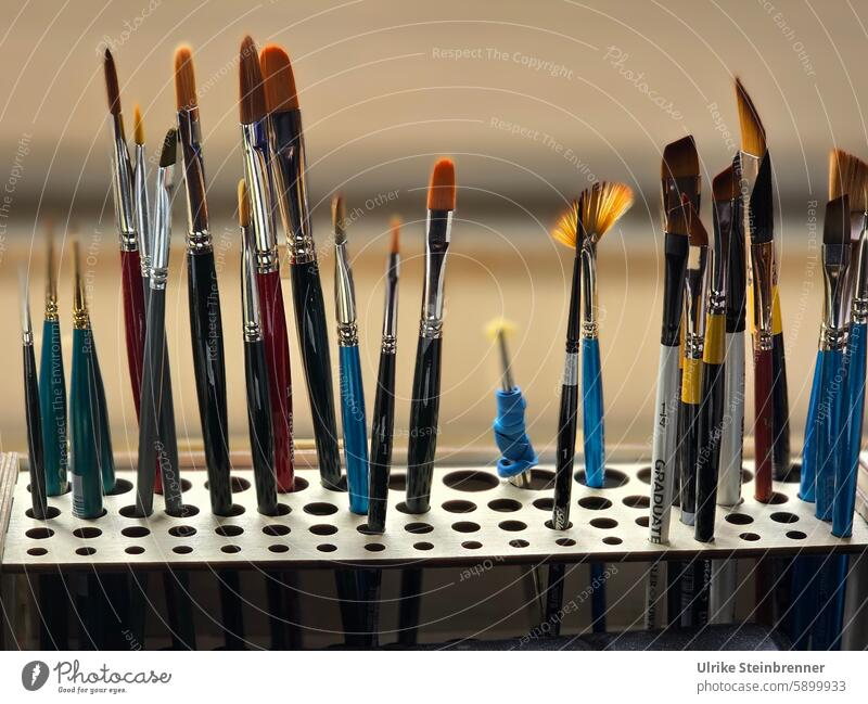 Painting brushes on hold Paintbrush paintbrush Watercolour brush watercolour painting Art artistic needs Tools of the trade Painting equipment painting tool