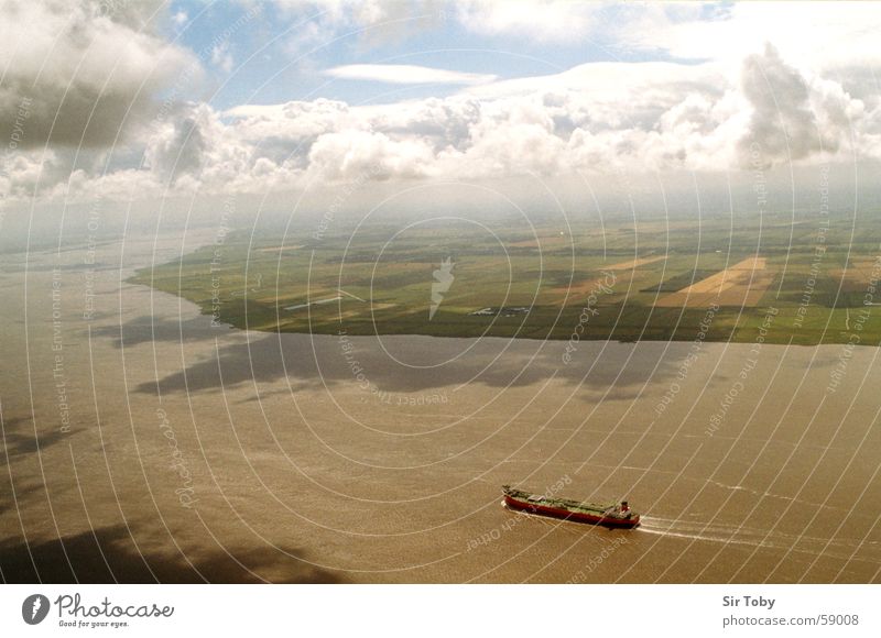 over the Elbe Aerial photograph Watercraft Clouds Bird's-eye view Schleswig-Holstein River Field Sky Far-off places Fog Landscape Horizon Clouds in the sky