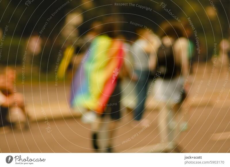 Proud with rainbow flag Couple Man Woman Homosexual Symbols and metaphors LGBTQ queer blurriness defocused background Silhouette Pride bisexual Identity variety