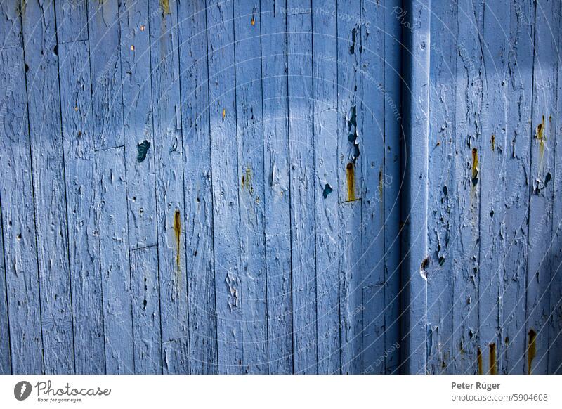 Blue wooden wall in the sunlight Wood Wall (building) door panels structure Surface Rust shabby Old decoration Decoration background Shadow Colour vintage