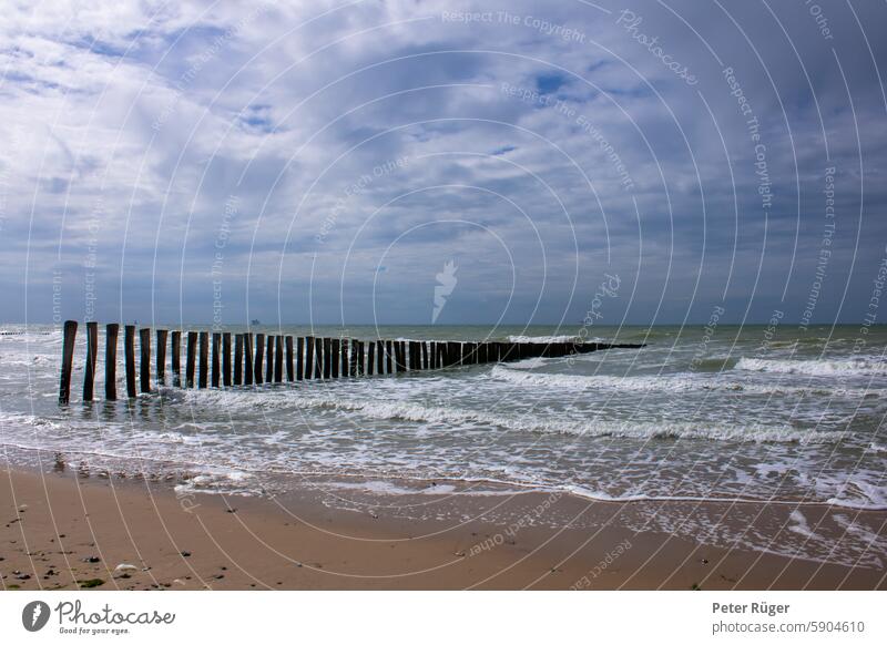 North Sea beach with rough seas Beach groynes North Sea coast France Opal Coast Ocean harsh Sky Sand Vacation & Travel Landscape Tourism vacation Clouds