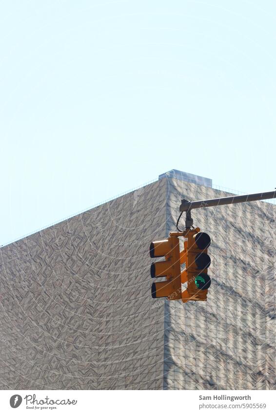 Traffic light against the blue sky in manhattan manhatten - new york city traffic Traffic infrastructure Blue sky background sunny Minimal Minimalistic