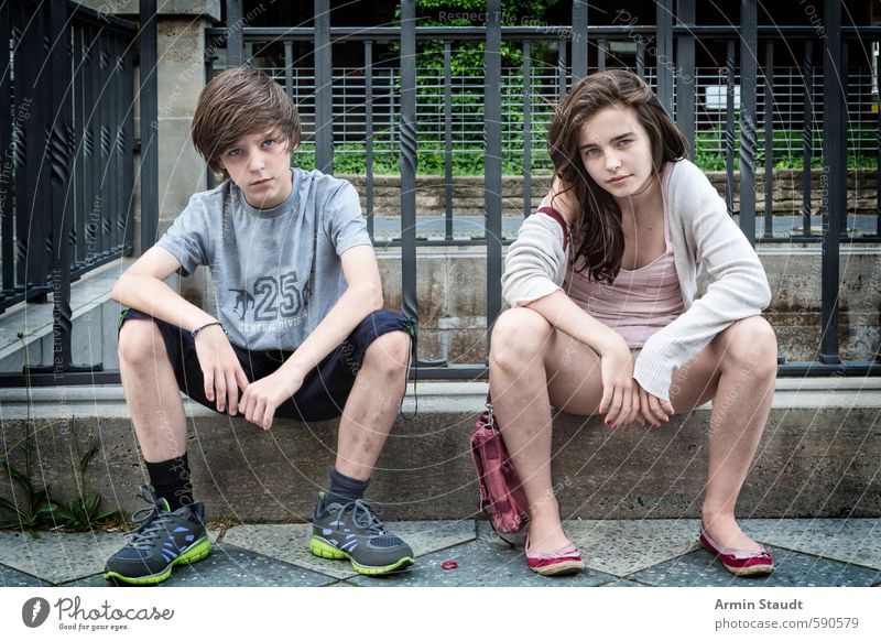 Portrait of two siblings Lifestyle Human being Masculine Feminine Youth (Young adults) 2 8 - 13 years Child Infancy 13 - 18 years Summer Town Wall (barrier)