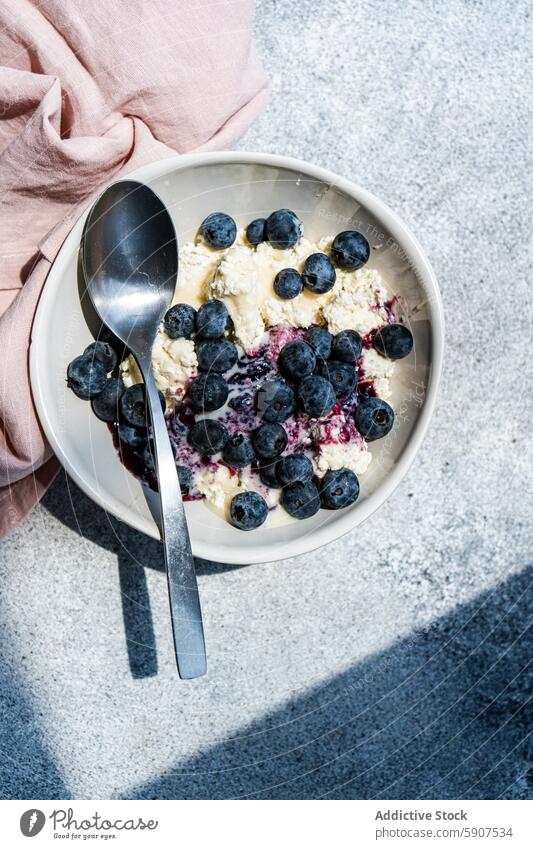 Cottage cheese breakfast with blueberries and jam cottage cheese blueberry organic nutritious bowl fresh silver spoon meal morning dairy fruit healthy eating