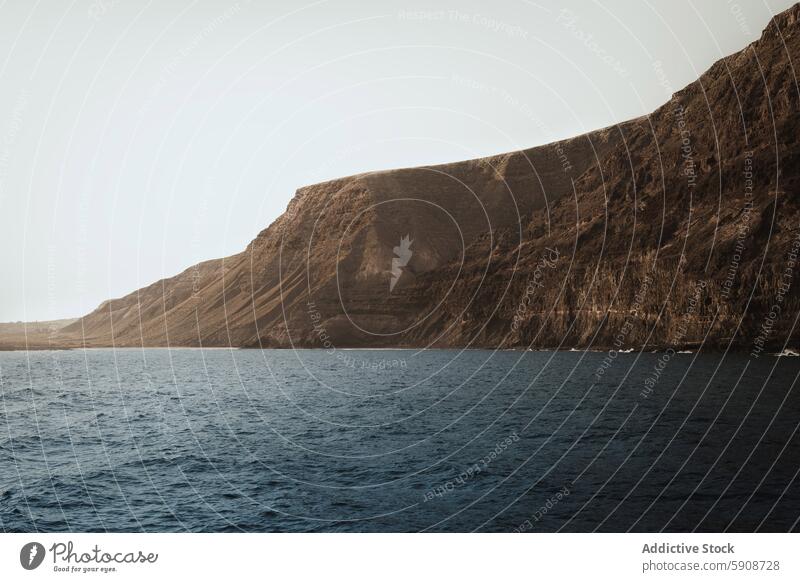 Majestic Coastal Cliffs Along the Sea in Lanzarote Canary Islands coastal cliffs sea ocean landscape nature scenery dramatic geology outdoors travel adventure