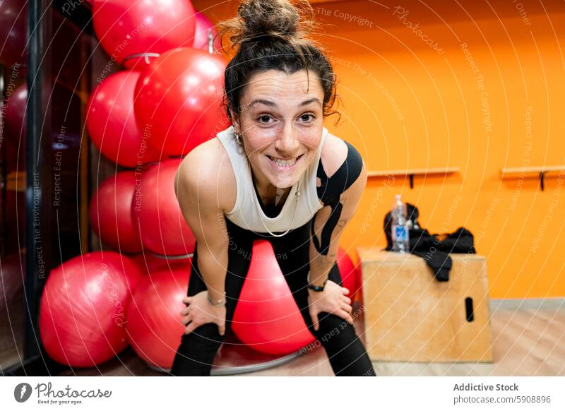 Smiling Young Woman During Powerlifting Workout woman gym powerlifting fitness workout smile athlete sport healthy strength training exercise young energy