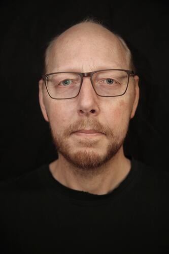 Portrait , male Looking into the camera Man portrait Face Facial hair Head Facial expression Character Earnest masculine Eyeglasses bald confident