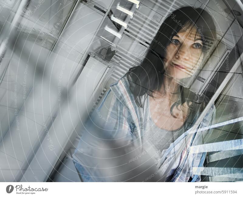 An exhausted woman in the bathroom in the morning Shower Woman Window Bathroom Clean Living or residing Mirror reflection Interior shot blurred Dark-haired