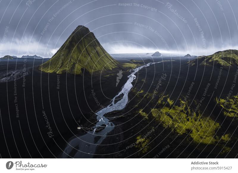 Dramatic aerial view of Maelifell Volcano in Icelandic Highlands iceland maelifell volcano highland photograph dramatic moody atmosphere green moss volcanic