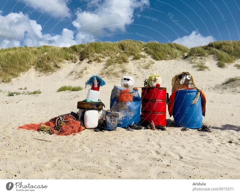 Garbage sculptures on the dune beach Trash Beach Sand duene Sculpture Figure Ocean collect rubbish Environmental pollution Recycling Environmental protection