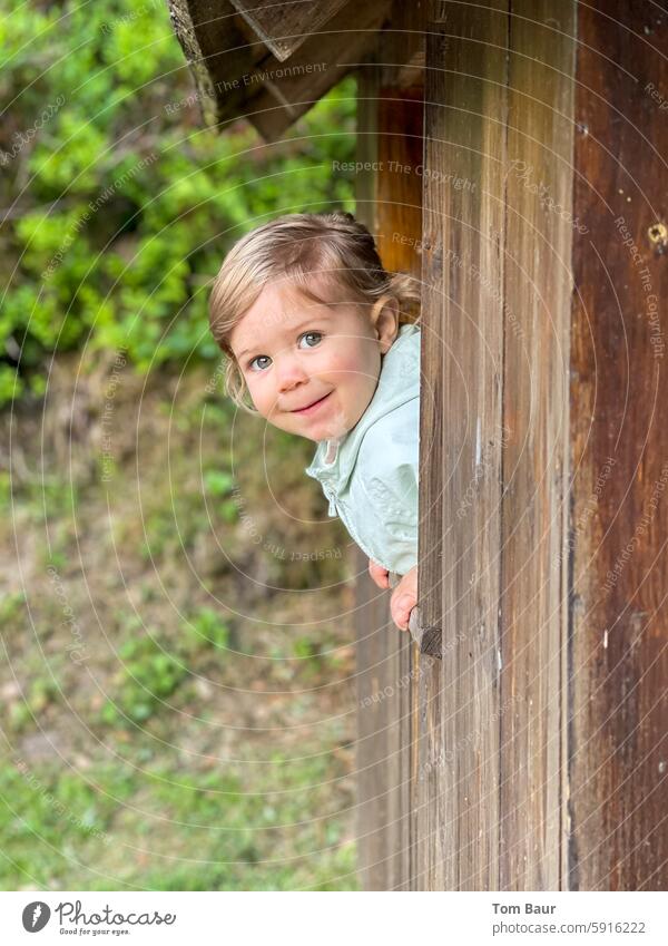 Cuckoo who's there at my little house Girl cute looks out of the window Playground View from the window View from a window Window Looking Summer Light Child