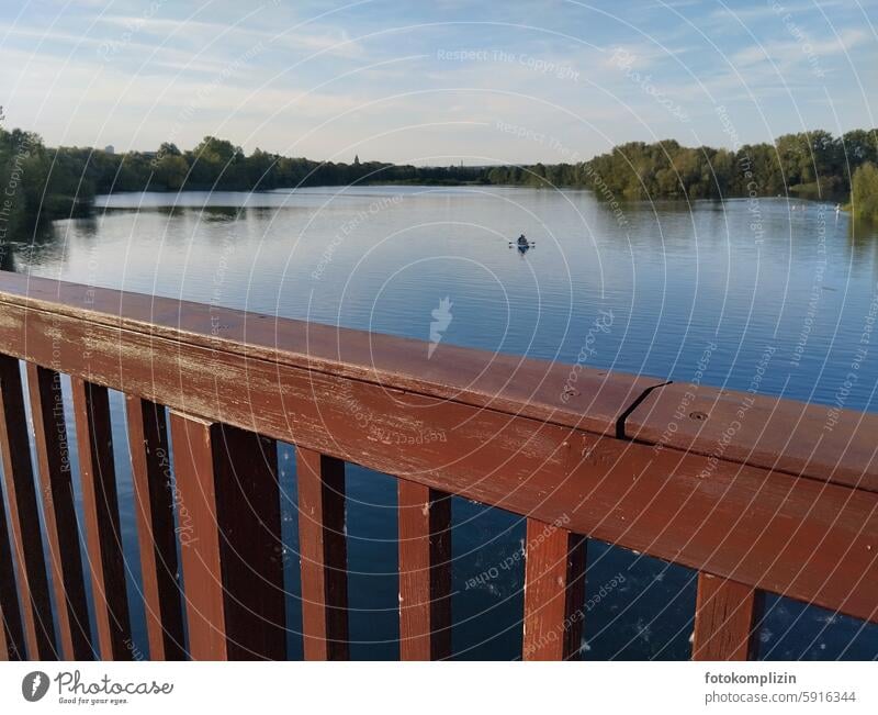 Lake with bridge parapet Bridge railing Water Body of water Nature wide Surface of water silent tranquillity Peaceful Landscape Horizon Beautiful weather