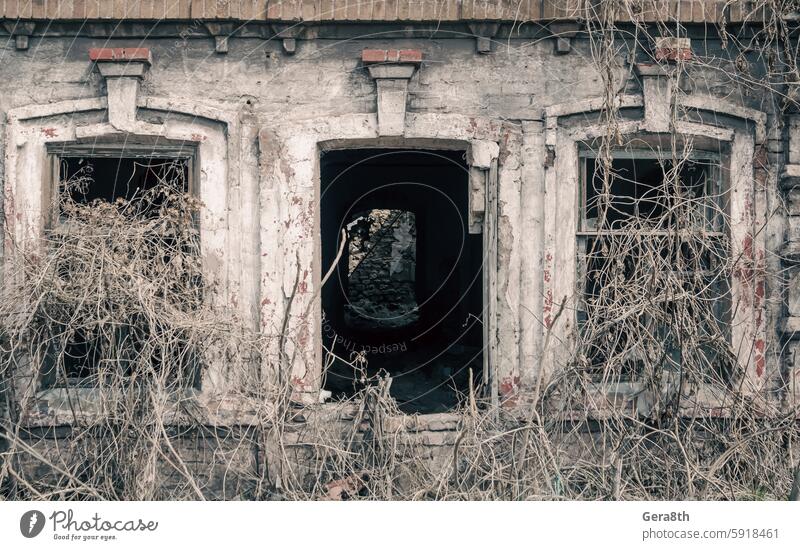 old abandoned house in Ukraine Donbass Donetsk architecture backdrop background block blue brick building buried city closed window color conflict covid