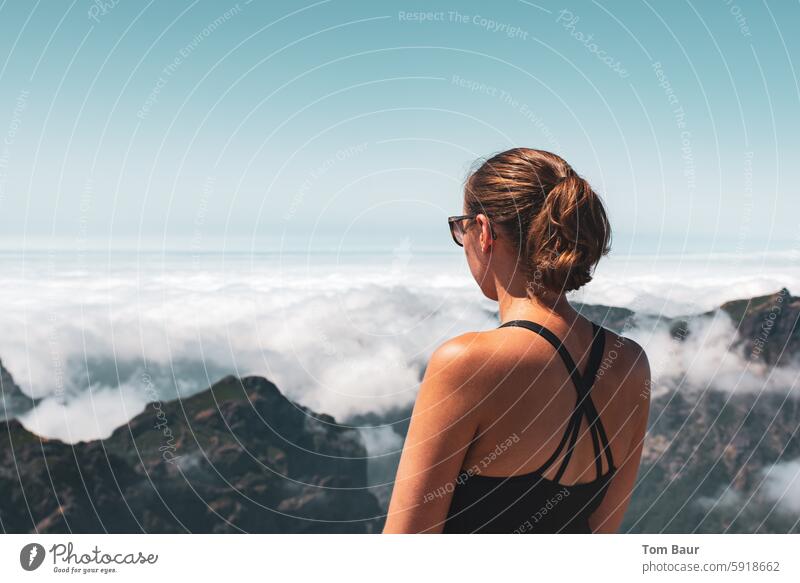 Above the clouds - young woman enjoys the view above the clouds enjoying the view Clouds Woman Looking Sunglasses Mountain Vantage point Freedom Peak