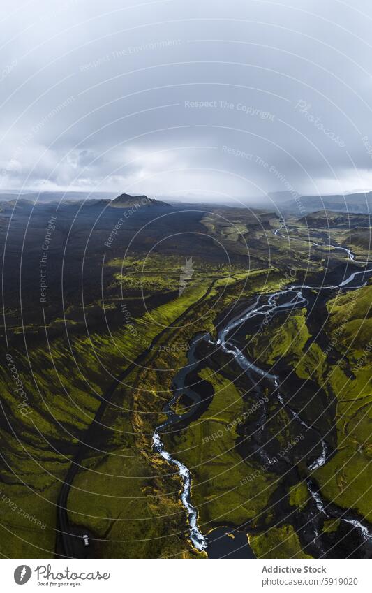 Dramatic aerial view of Iceland's Highland rivers and mountains highland iceland landscape volcanic green black moody sky dramatic contrast nature outdoor