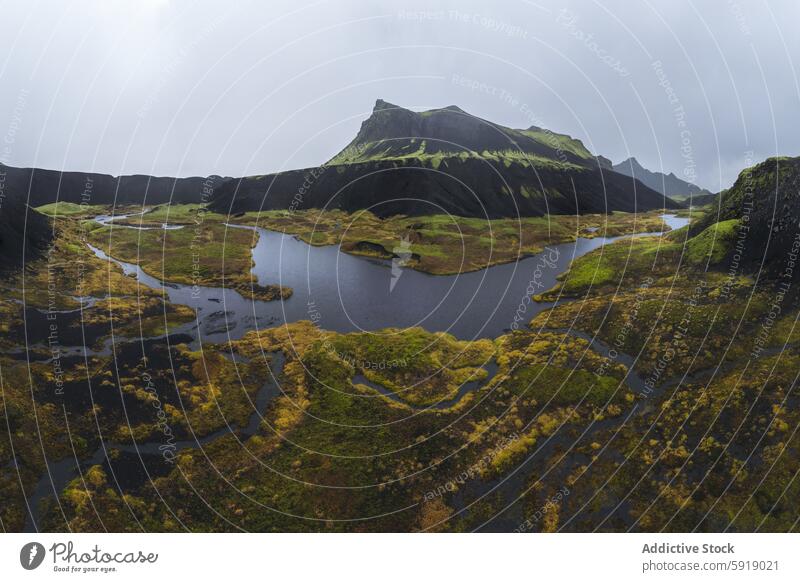 Captivating aerial view of Highlands, Iceland with mist landscape iceland highlands mountain green moss water blue serene nature outdoor scenic beauty lush