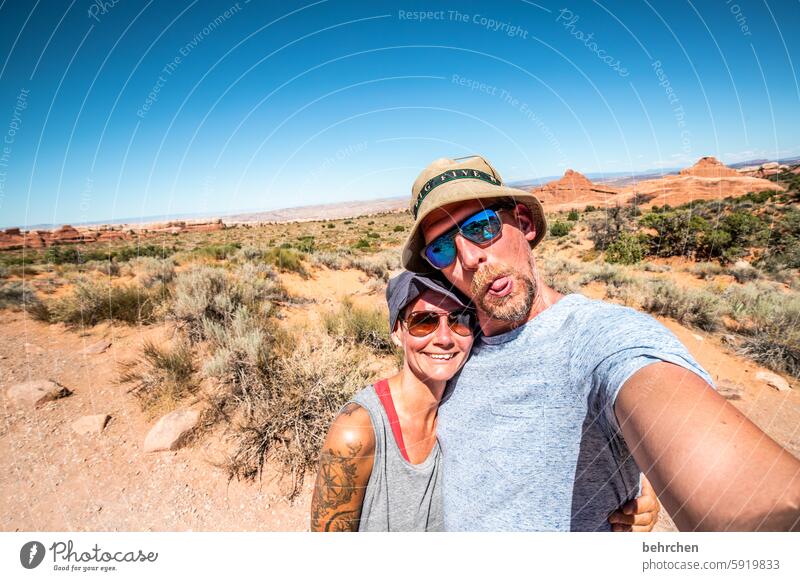 <3 portrait Exterior shot Sunglasses Congenial Crazy Funny Tattoo Love Together Contentment Happiness Happy Joy Smiling Laughter Couple Partner