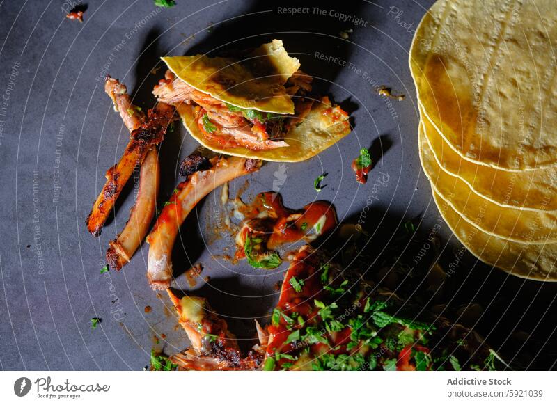 Deconstructed rib tacos with fresh garnishing on dark surface deconstructed herb salsa corn tortilla spicy meat texture background food cuisine ingredient