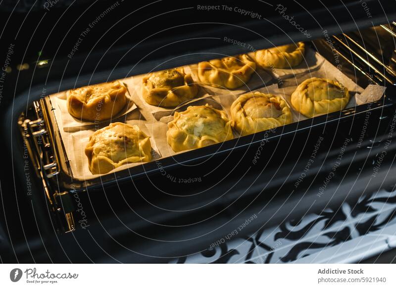 Traditional Mallorcan Lamb Pies in Oven mallorcan lamb pie pea ensaimada traditional easter oven baked delicacy year-round panades pastry cuisine food home