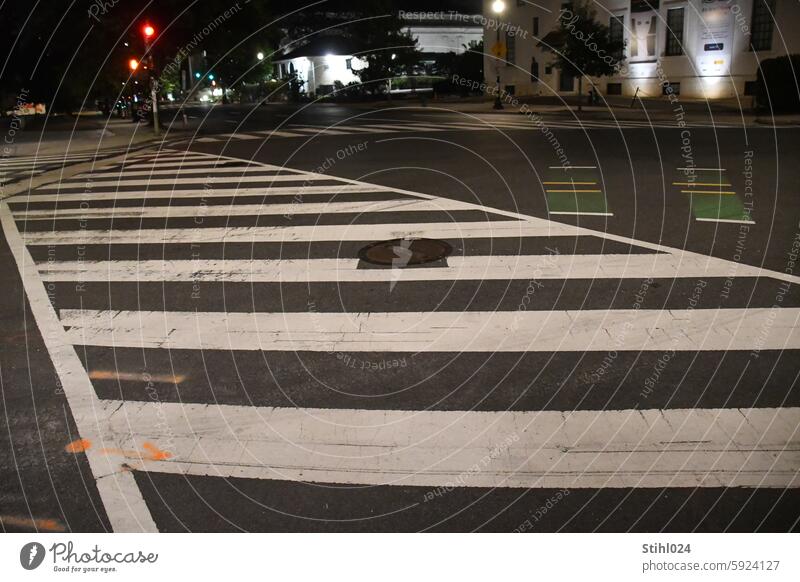 Road crossing with wide crosswalk in the USA Zebra crossing Street Crossroads Stripe black-and-white Striped Night Night shot Asphalt Street lighting