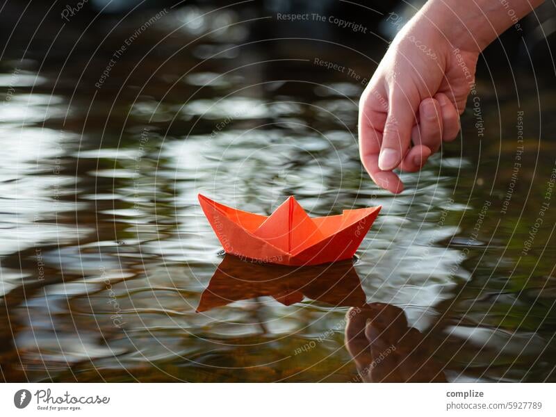 Last .....good trip! Paper boat Target Sailing ship Navigation Beach River bank coast Lakeside Waves Nature Water Environment Child Sun Summer vacation Freedom