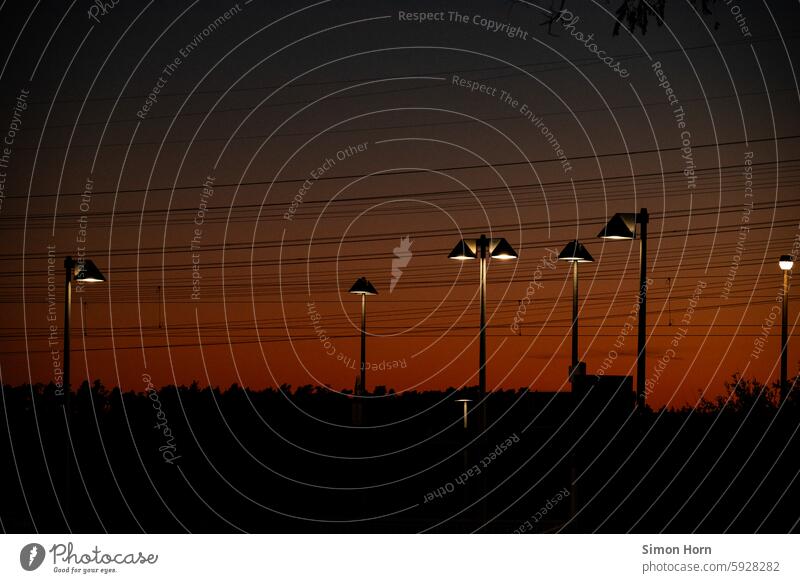 Light atmosphere of dusk and a multitude of street lamps Dusk Mood lighting lanterns light sources nightfall Lighting Flare sunset Twilight Evening Sunset Sky